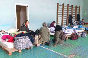 Provisorische Unterkunft für Flüchtlinge in einer Turnhalle